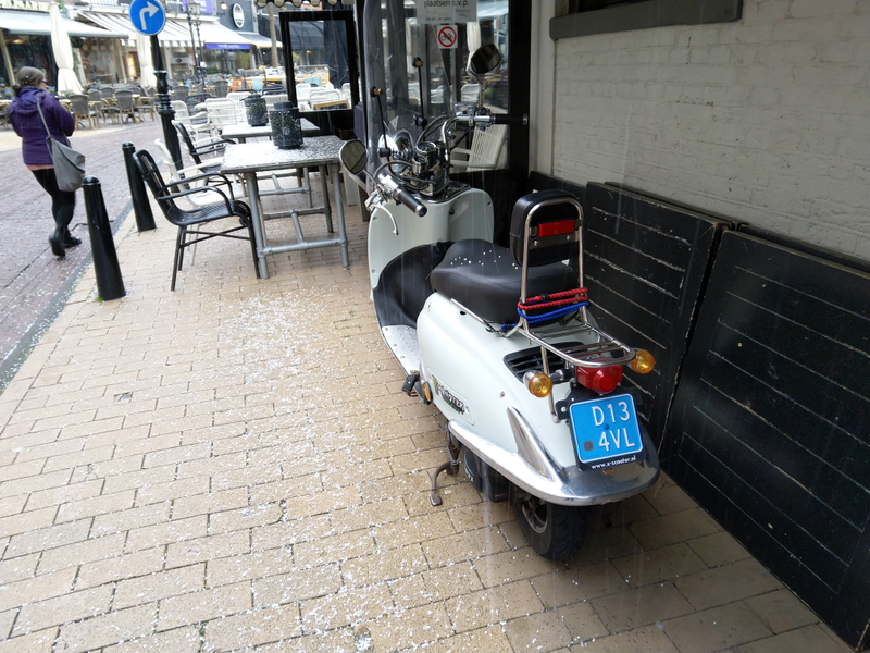 dis a nice scooter would not.... well... its pretty average actually... but it was parked right outside a pub we ducked into when the weather happened so its cool by me
